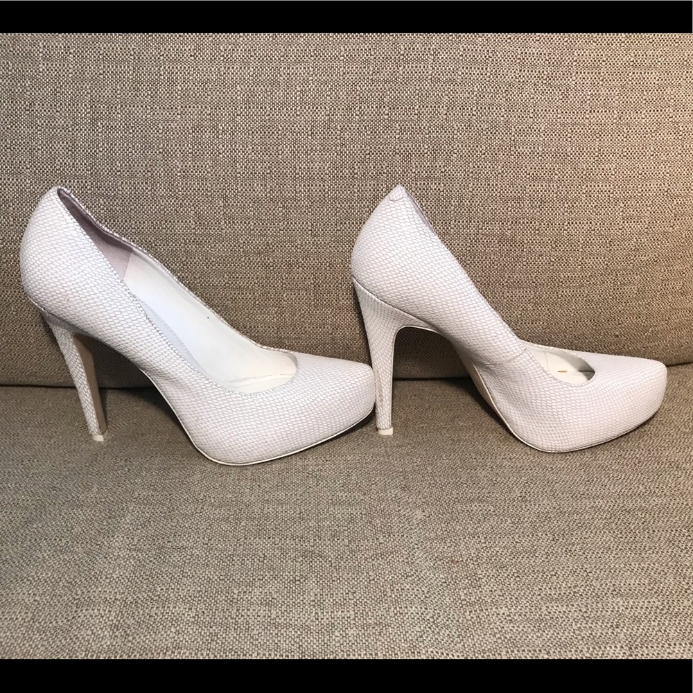 BCBGeneration white pumps/high heels.